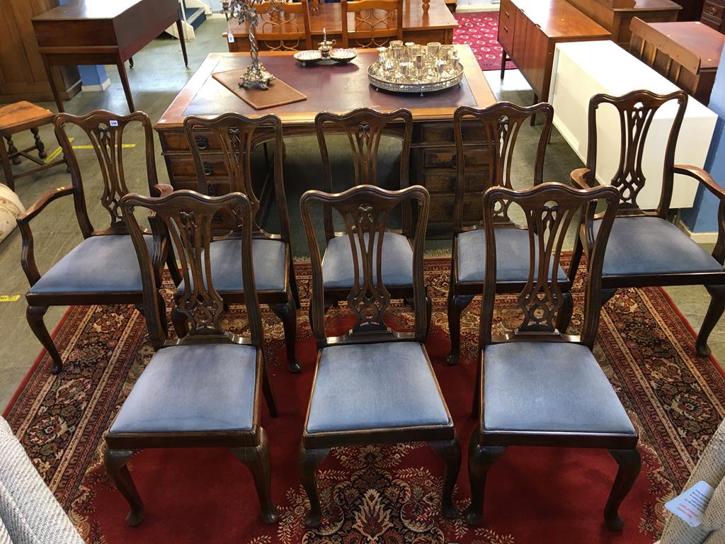 A set of mahogany chairs comprising; six single and two carvers