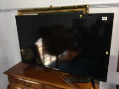A Blaupunkt 42" TV, with remote