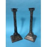 A pair of silver plated Corinthian column candlesticks, 33cm height