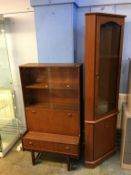 A G Plan teak bookcase and a corner cabinet