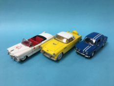 Three model cars