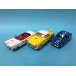 Three model cars