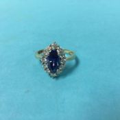 A 14ct gold tanzanite and white stone ring, size 'P/Q'