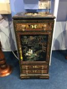 A small Oriental design cabinet with three drawers, 35cm wide, 76cm high