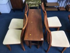 Teak drop flap table and four chairs