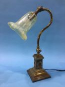 A late 19th century brass angle poise table lamp with Pearline shade, 43cm height