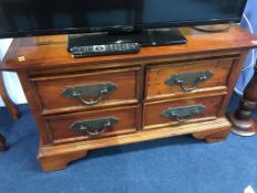 A modern four drawer chest, 101cm wide