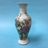 A Chinese baluster shaped vase, decorated with chrysanthemums and exotic birds, 28cm height
