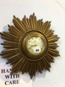 A giltwood Sunburst wall clock