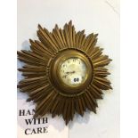 A giltwood Sunburst wall clock