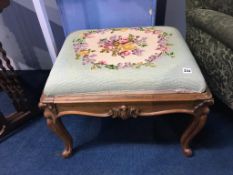 A walnut cabriole leg stool, with needlework drop in seat, 64 x 50cm