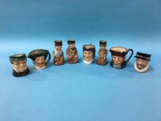Eight small Royal Doulton Toby jugs
