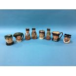 Eight small Royal Doulton Toby jugs