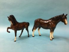 A Beswick horse and one other (2)