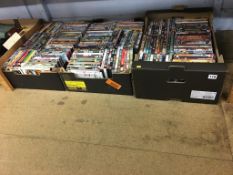 Three boxes of DVDs