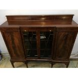 An Edwardian mahogany china cabinet, 150cm wide