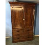 A Victorian mahogany linen press, (no interior drawers), with moulded cornice, panelled doors