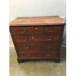 A Georgian mahogany straight front chest of drawers with four long graduating drawers, all with