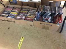 Three boxes of DVDs