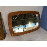 A teak framed mirror, 38 x 60cm