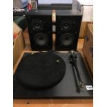 A Rega Planar 3 turntable and a pair of Rega Kyte speakers