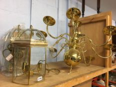 A brass light fitting and two others (3)