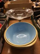 Two mixing bowls and a glass taza