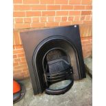 A cast iron fire back