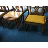 A teak stool and a teak nest of tables