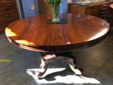 A William IV rosewood circular breakfast table, with quadruple scrolling base, 138cm diameter