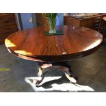 A William IV rosewood circular breakfast table, with quadruple scrolling base, 138cm diameter