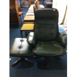 A green leather swivel chair and stool