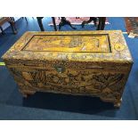 A small carved Oriental chest, 89cm length