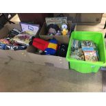 Four boxes of assorted toys and games