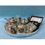 A silver plated tray and three silver plated teapots etc.