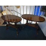 A pair of mahogany oval occasional tables