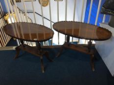 A pair of mahogany oval occasional tables