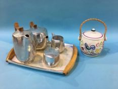A Picquot ware tea set and a Poole biscuit barrel