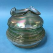 A Loetz style iridescent glass vase