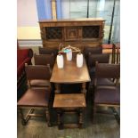 An oak dining room suite and a stool