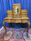 A good quality walnut ladies writing desk, with marquetry inlay and cross banding, brass gallery