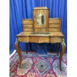 A good quality walnut ladies writing desk, with marquetry inlay and cross banding, brass gallery