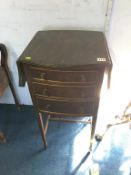 A mahogany drop flap table, with three drawers