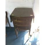 A mahogany drop flap table, with three drawers