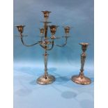 A silver plated candle stick and candelabra