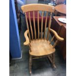 A lathe back rocking chair