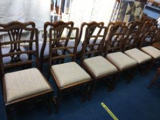 A set of six single mahogany ladderback chairs