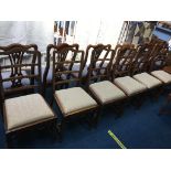 A set of six single mahogany ladderback chairs