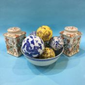 A pair of reproduction tea caddies and a blue and white bowl etc.