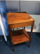 A mahogany two tier occasional table